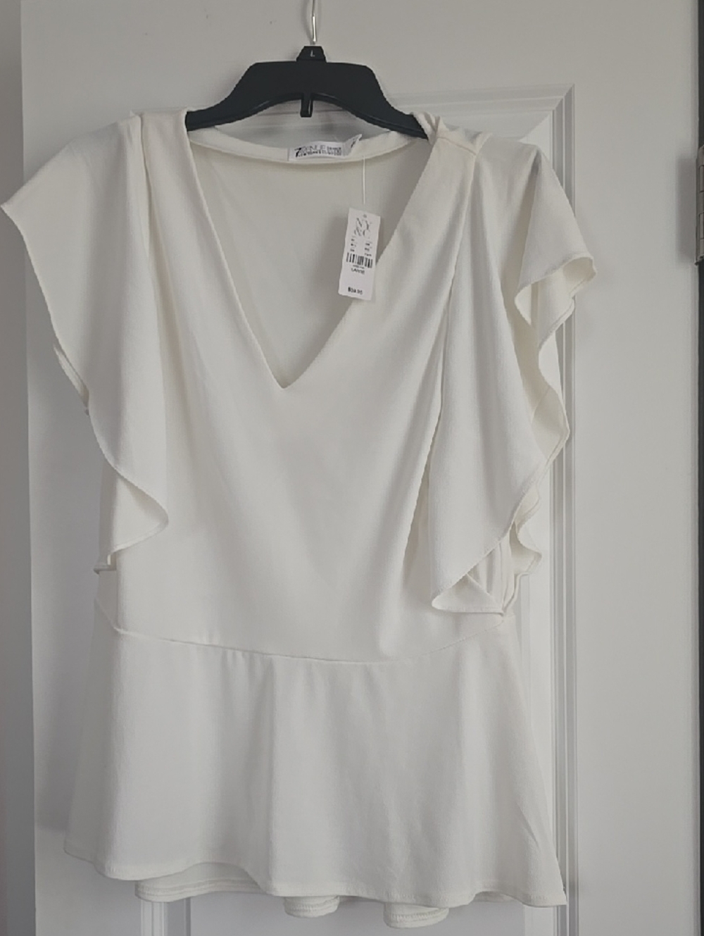 New York & Company Ivory V-Neck Ruffle Peplum Dress